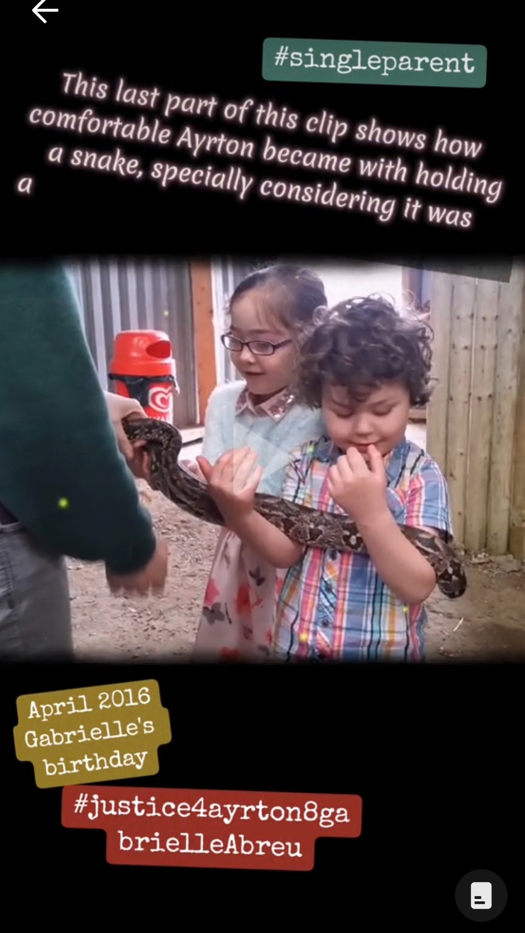 April 2016, photo of Ayrton & Gabrielle Abreu cautiously holding a snake at Woodside Wildlife park near Wragby, Lincoln. Daddy took them on this was a day out for Gabrielle's birthday. Click to watch full clip