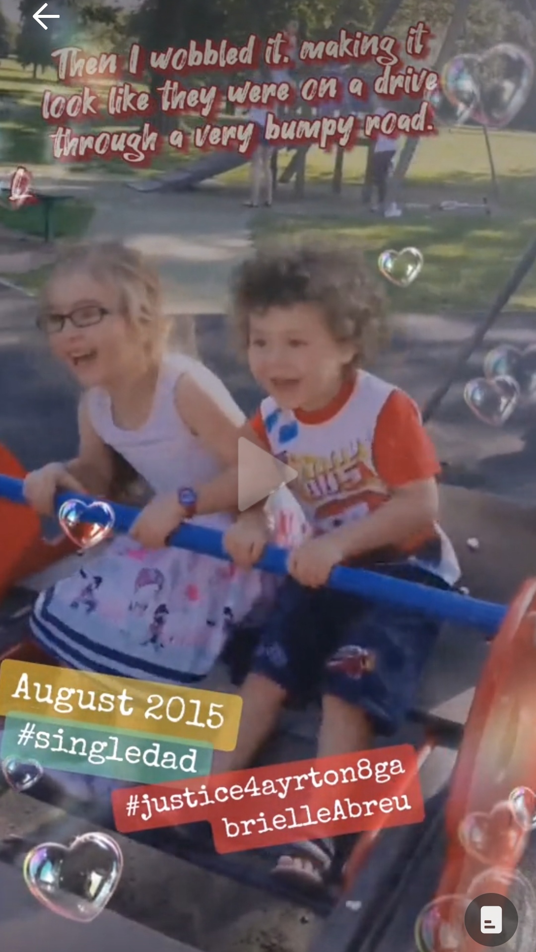 August 2015, photo of Ayrton & Gabrielle laughing their heads off at daddy shacking the seesaw they we're sat at, on Weelsby Woods Grimsby. Click to watch full clip