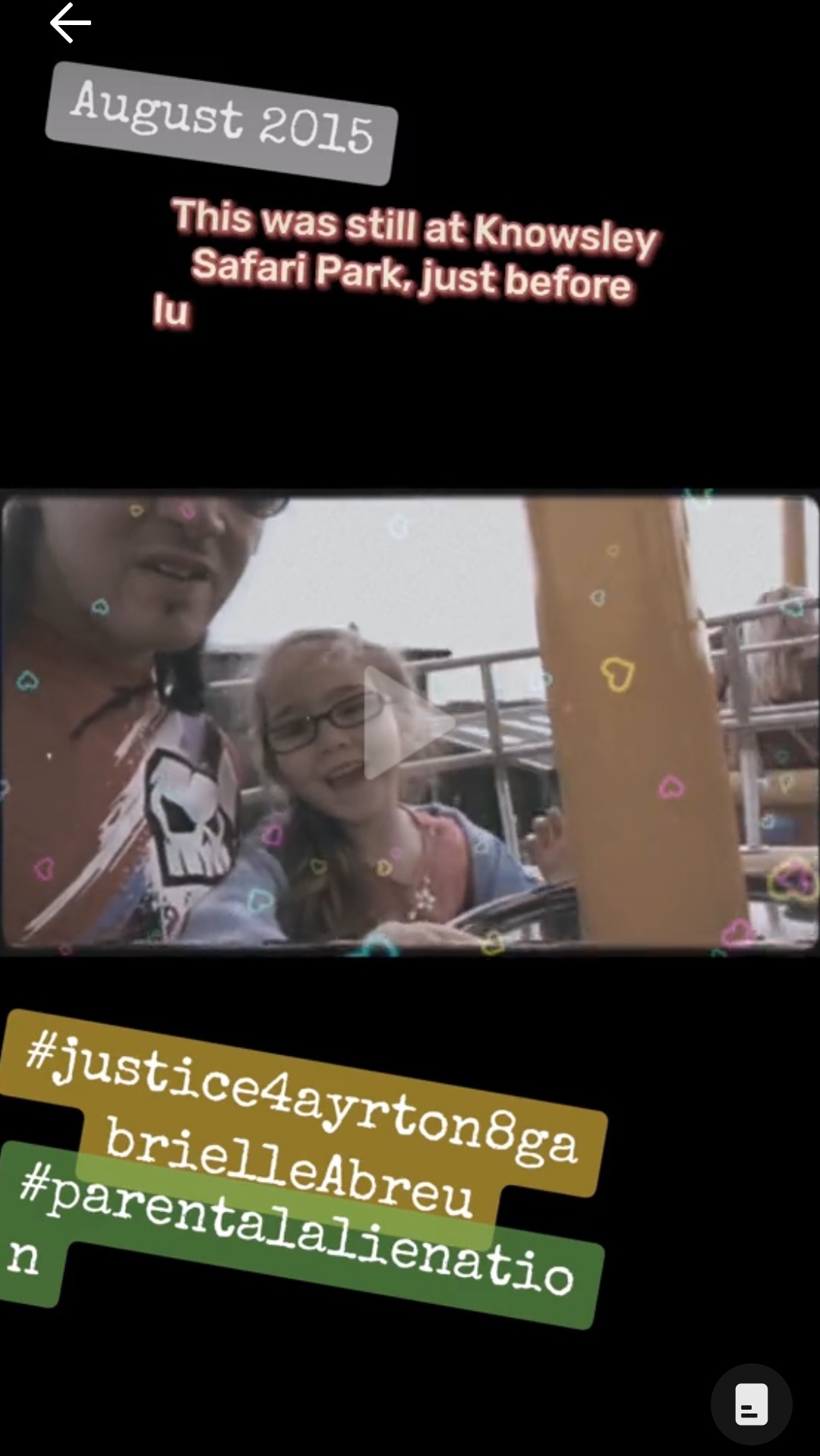 August 2015, photo of Gabrielle with daddy on a fairground ride, with a huge smile on Gabrielle's face, at Knowsley safari park near Liverpool. Click to watch full clip